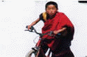 Bhutan monks with cycle